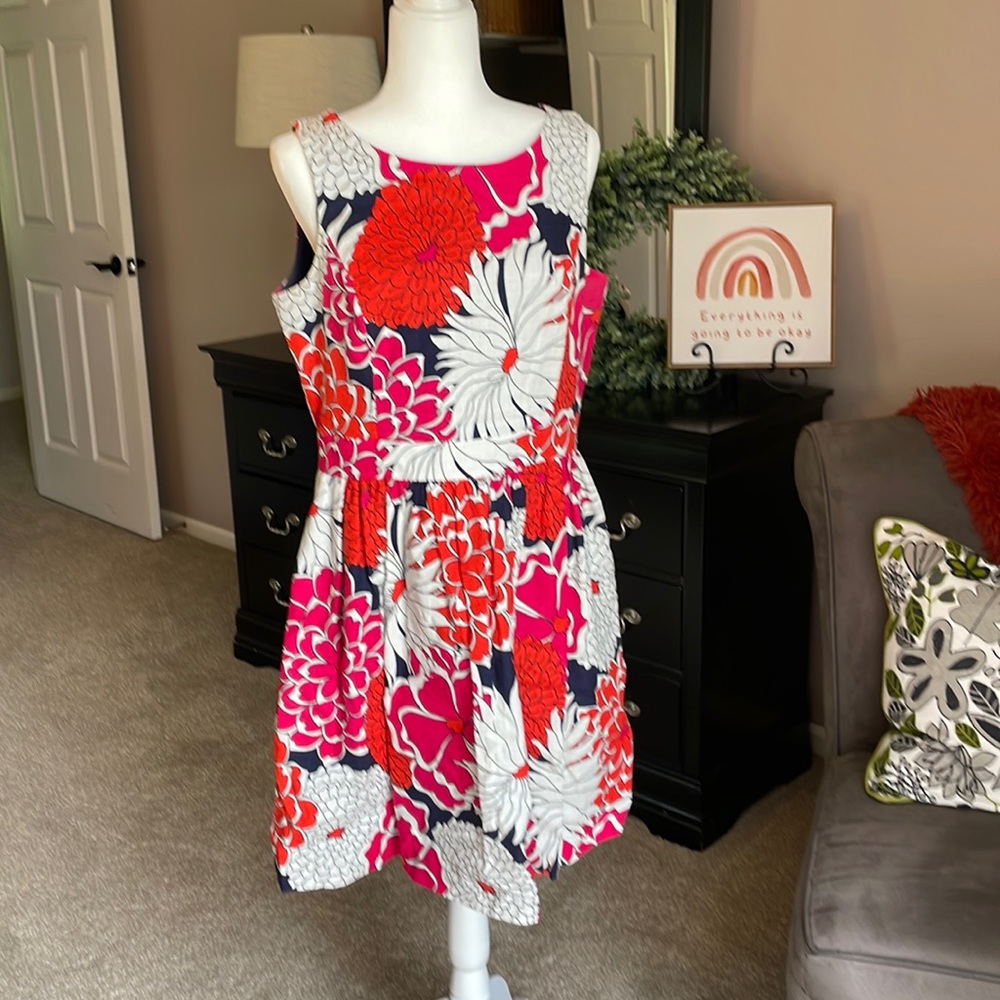 Feel Bright and cheerful with this colorful floral dress. Fully lined.